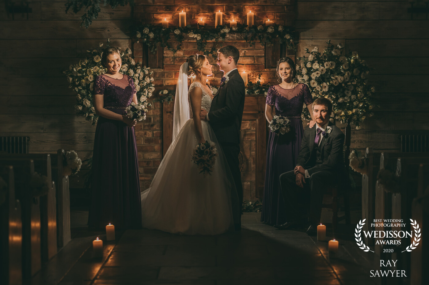 Vanity Fair styled image of the bride and groom with the bridesmaids and best man. Each person lit individually and composited to a final dramatic image. Hope you love it.