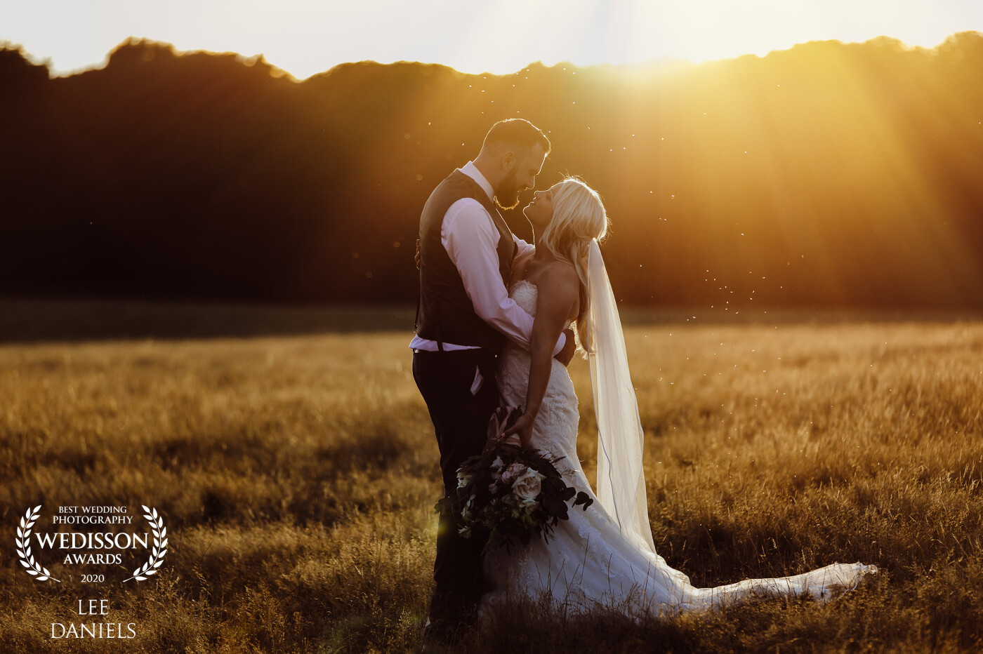 Deep into summer when golden hour is at its best, I held out till the last minute, which at times can be a risk, but on this occasion, it paid off, what an evening for Hayley & Charlie. It was so good we even got the whole bridal party out into the fields after having some fun in this gorgeous light. <br />
 Venue - Hazel Gap Barn.