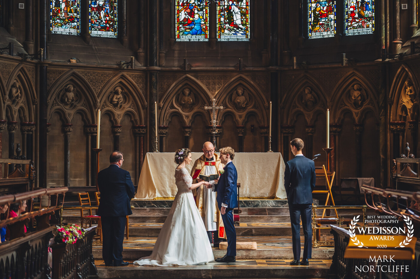 Jennifer and Stephen got married at the magnificent St John College Chapel in Cambridge. The stunning leaded stained glass windows at the end of the chapel wrapped a beautiful light around the gallery.  Amazing elegant and sophisticated wedding day for a very special couple.
