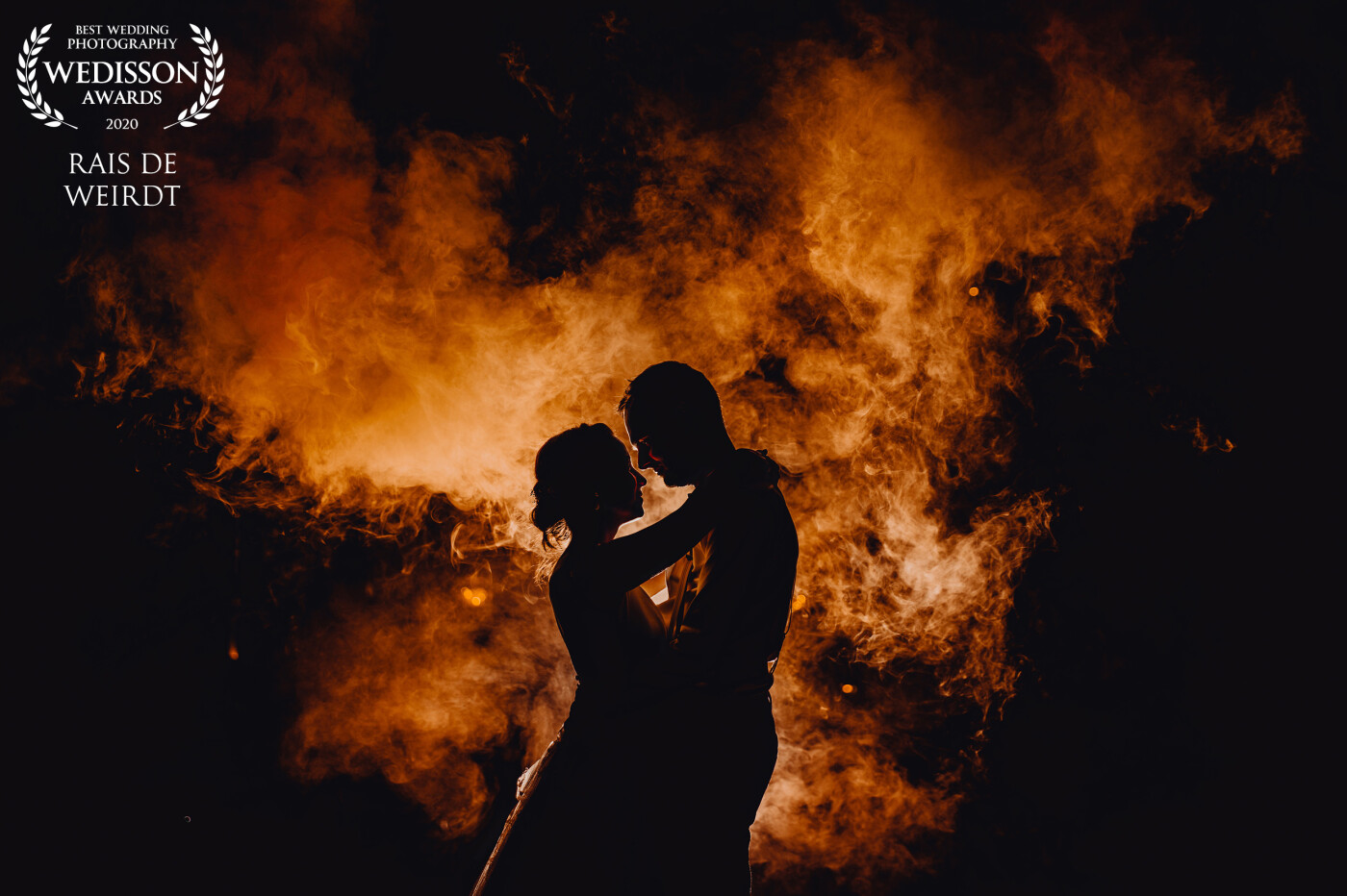 Is there any way to capture passion more strongly and intensely as with a backdrop of fire? I love it when, as a photographer, you're able to let the true passion of a couple speak through the photograph.