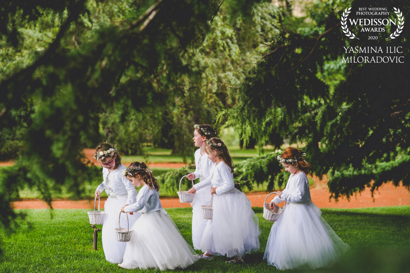 These 5 adorable flower girls walked down the aisle and then collectively walked back towards the bride. This was at Bendooley Estate in Berrima, Australia.