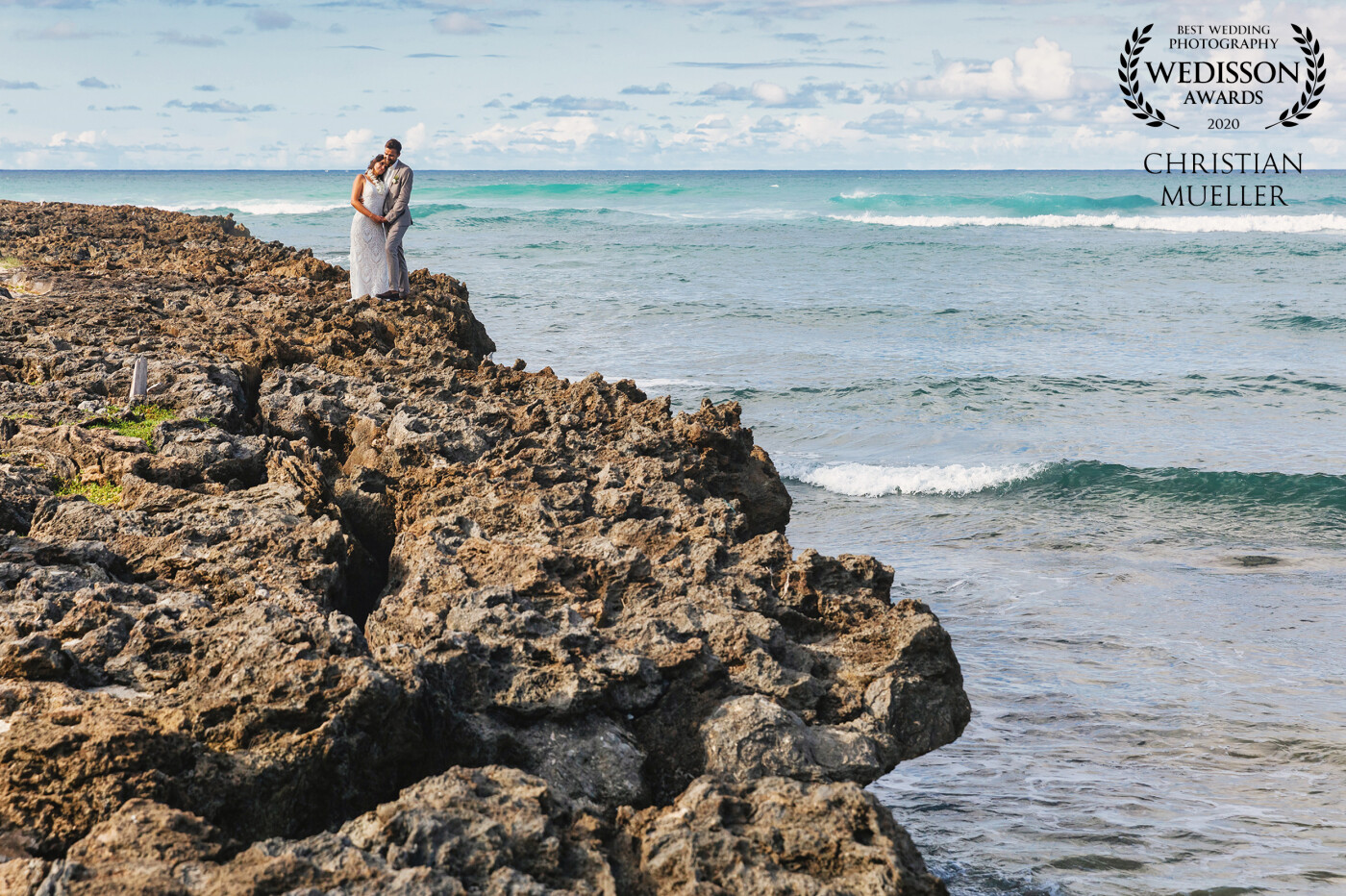 It was such a great experience with this cute couple at this amazing destination in Oahu, Hawaii. We did the couple shoot in Kawela Bay Beach Park. There were countless views of great photos. I particularly like the structures of this rocky stretch of coast.