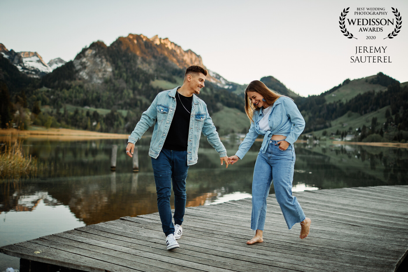 An engagement session at the edge of a mountain lake in Switzerland. At the end of the session, the couple just came up to me laughing!