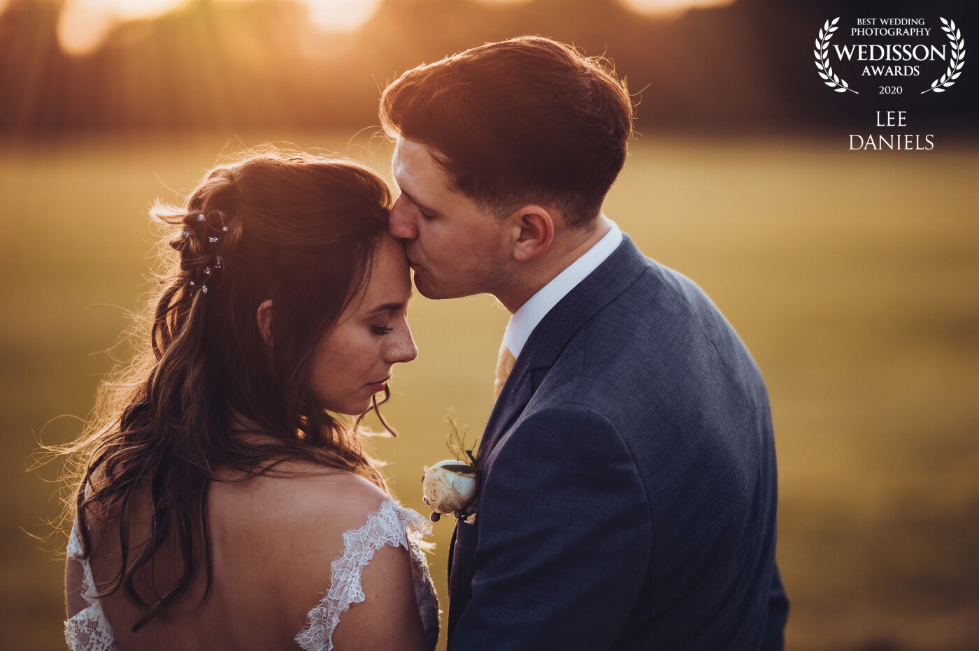 The summer sun was finally dipping below the horizon, Sarah & Blake had one last intimate moment before they headed back to greet their evening guest<br />
Venue - Burghley House Stamford 