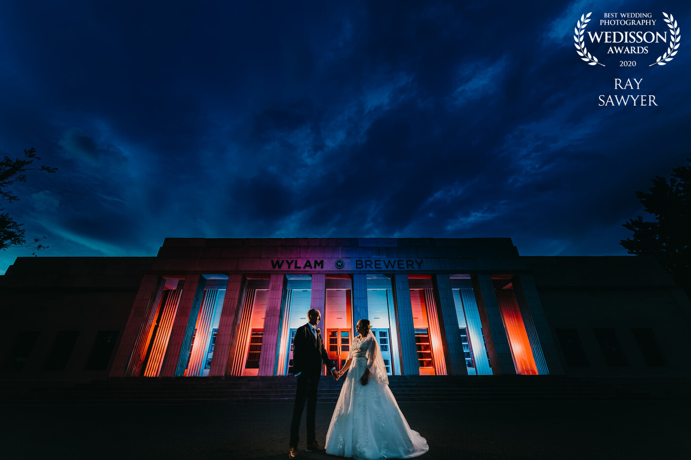 Captured at the stunning Wylam Brewery. This was captured about an hour before sunset and involved multiple flashes and colored gels to light the columns as well as a key light and rim lights for the couple. A very complex photograph to create but I hope you agree it looks awesome.