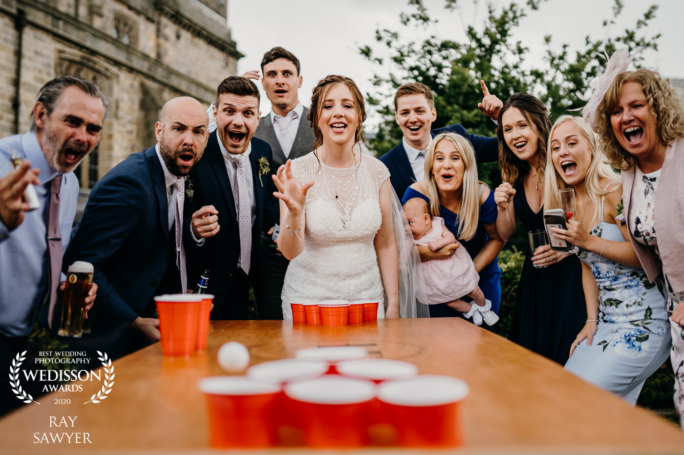 Beer Pong at a wedding - Great Idea! Especially when the bride nails it in the corner cup. Get chugging those beers, boys! The reaction of the guests is priceless!