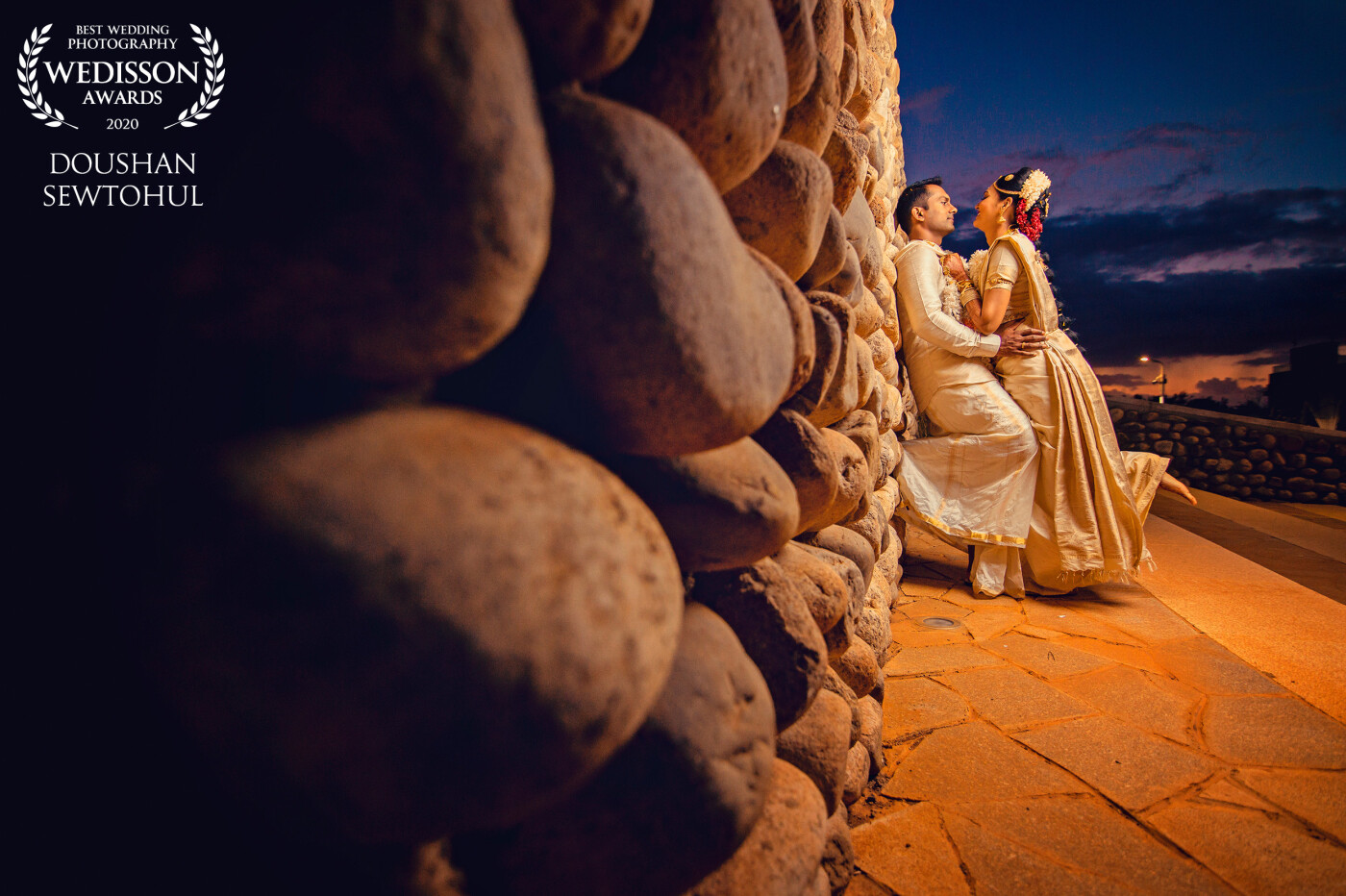 Those beautiful rocks...very well arranged and crafted... only added value to the couple's sweet moment.  Wendy the groom, wanted to have the last pic with the rocks. We were already very tired shooting from 5 am to 7 pm. But when I reached the side of the wall, the perspective was simply awesome. 