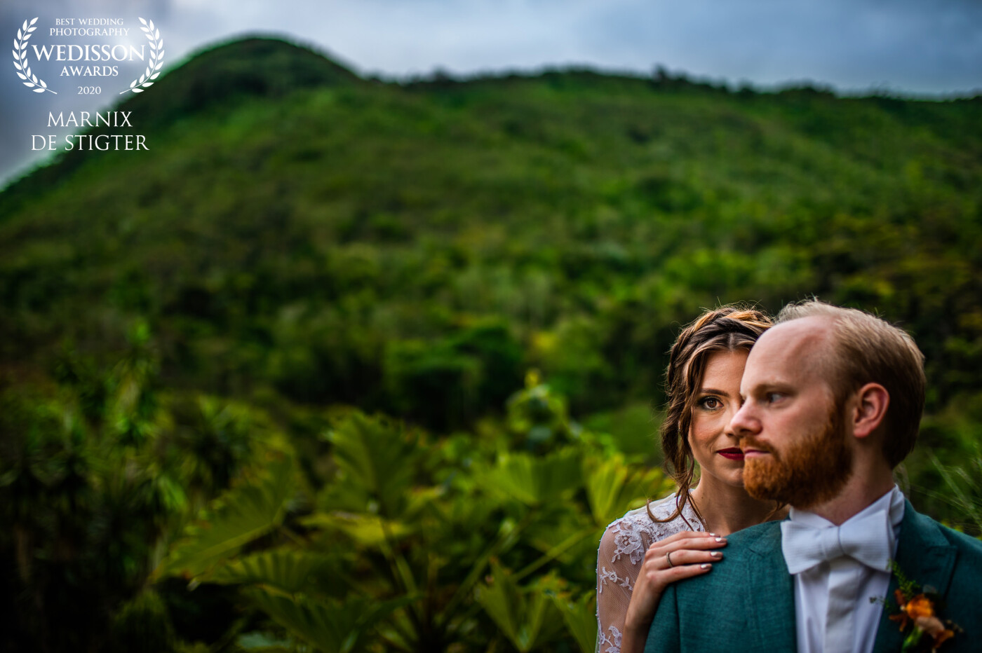 During a short posing session after this amazing outdoor wedding ceremony, I had to incorporate the beautiful backdrop in the image. I used the mountain top in the top left to balance the couple out in the lower right. I love the strong look of the bride in this image.