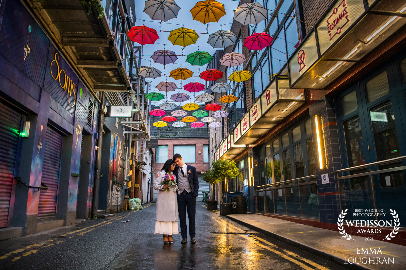 This micro wedding took place in Dublin City on a dark and wet day so we decided to run with a rain theme to our shoot and this location was the perfect fit. A lot of couples are afraid of rain on their wedding day but if you get the light just right it can be magical.