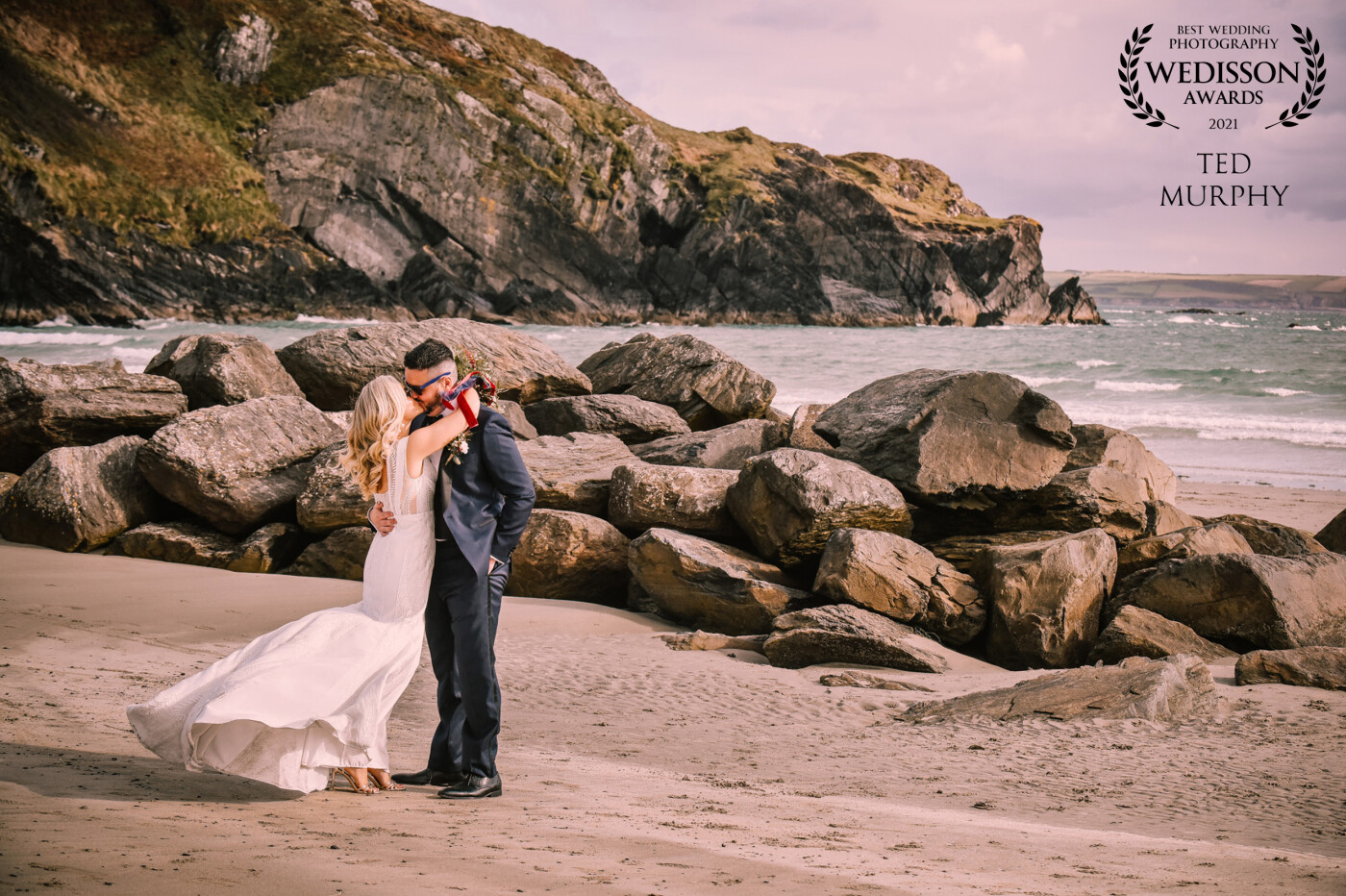 The breakers offered a fab backdrop for Orla & Eoin at Warren Strand, West Cork, along with the cliff backdrop and moody sky. This year has shown that less is more with only 25 guests permitted to weddings here in Ireland and now only 6 guests but once. The couple has each other all that is forgotten in these wonderful moments.