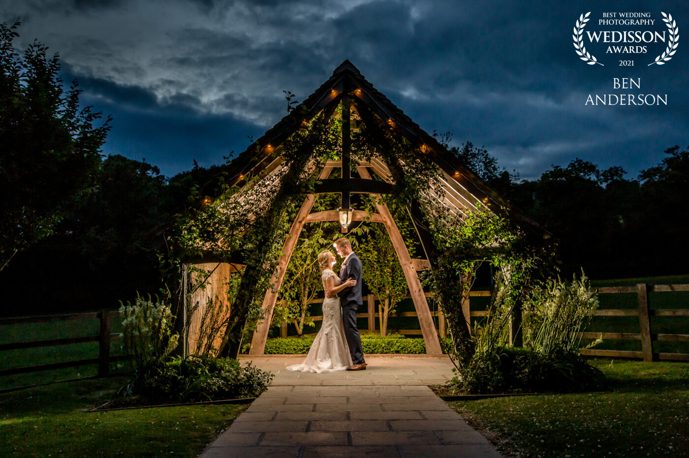 This image was taken a the beautiful Hyde House, situated in Stow On The Wold, in the glorious Cotswolds'.  It was a beautiful summer Wedding and this was taken at dusk under 'The Arbour' which looks out over acres of green fields.  