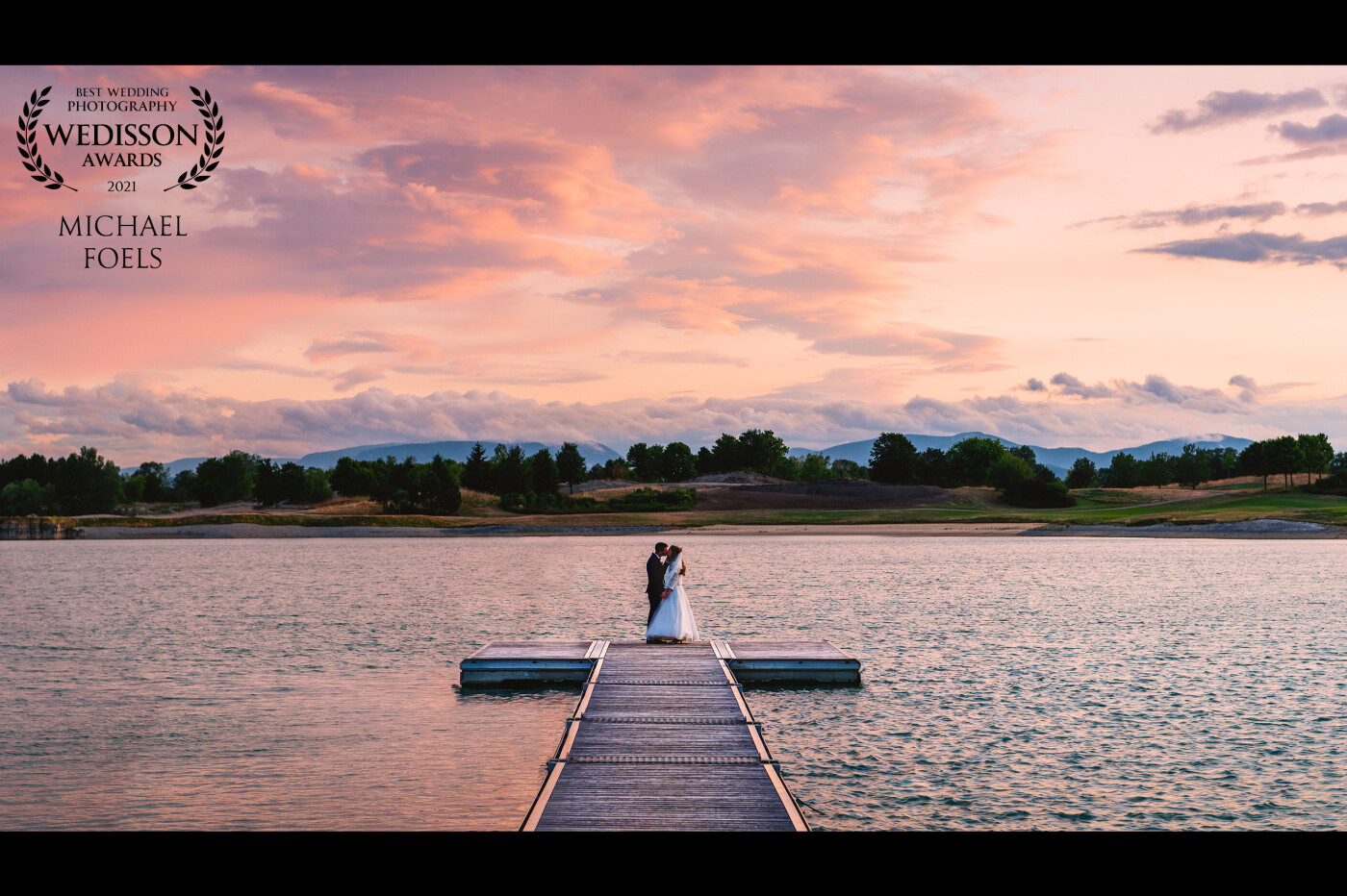 We were afraid that we would not be able to do our sunset shooting because some heavy rain hit the wedding location right after the ceremony. But after patiently waiting the rain went away and we were blessed with a crazy, colorful sky to do some final couple portraits for the day.