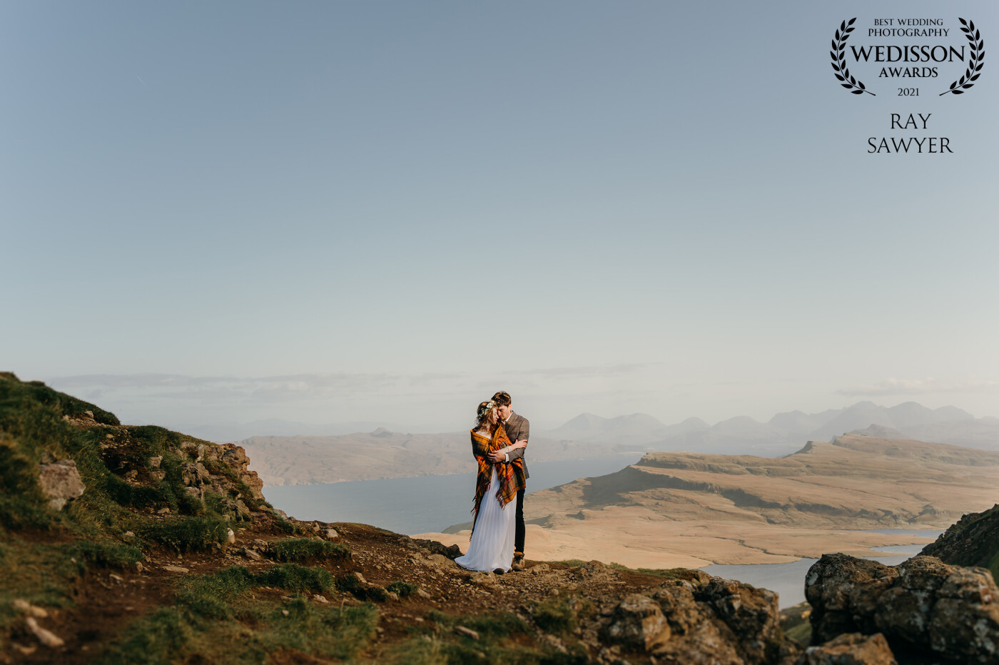 I captured this on an adventure shoot for one of my couples. We travelled 8 hours to the Isle of Skye and hiked up to the Old Man of Storr. What a place. beautiful. The couple look awesome in the surroundings. It was very cold that day too. haha