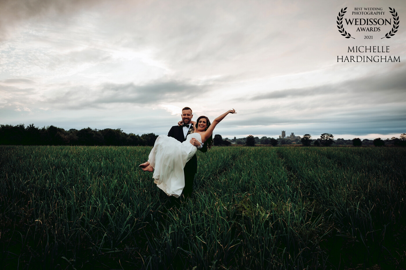 Its not always necessary to be calm and collected - sometimes we just need to kick off a shoes and chase the sunset. Taken at the wedding of Matt and Lauren at The Old Hall Ely.