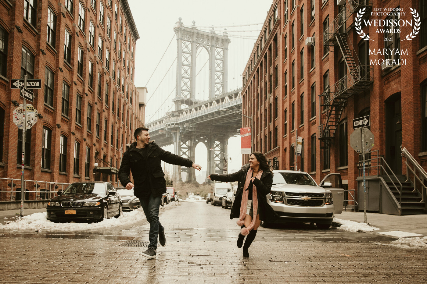 Dumbo and it’s surrounding are always my favorite spots for engagement sessions, The energy of this location allows you to express what you have within.<br />
<br />
Here, In this iconic spot I asked Emily and Zack to run in the middle of street and show their joyful moments and love. The image came out in a way that I was expected.<br />
@marymor_photography<br />
New York City, US