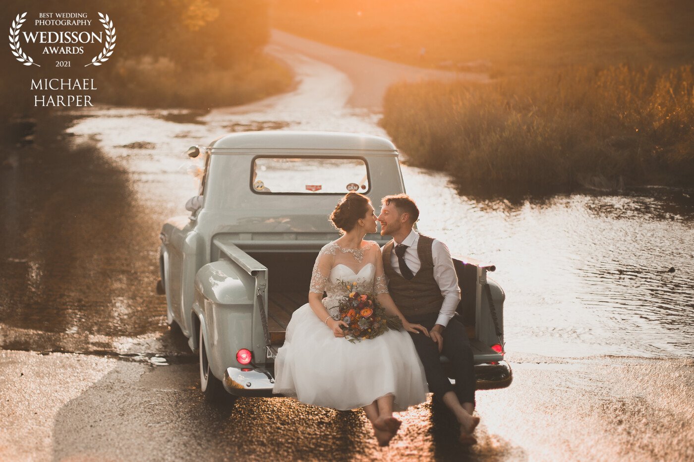 A country Tepee wedding that finished with some sunset couple shots. The last scene was slowly driving through a shallow stream as the couple smiled and kissed on the back of the truck. All natural light and great fun!