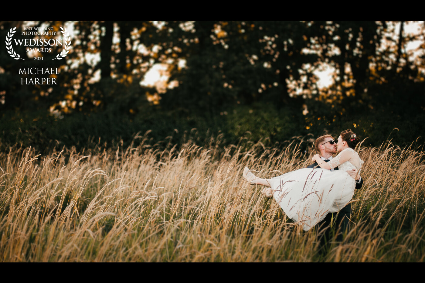 A beautiful moment when the groom picked up the boho bride the long grass and span her round for fun just at sunset. All day this couple had been great fun and were genuinely loving every moment.