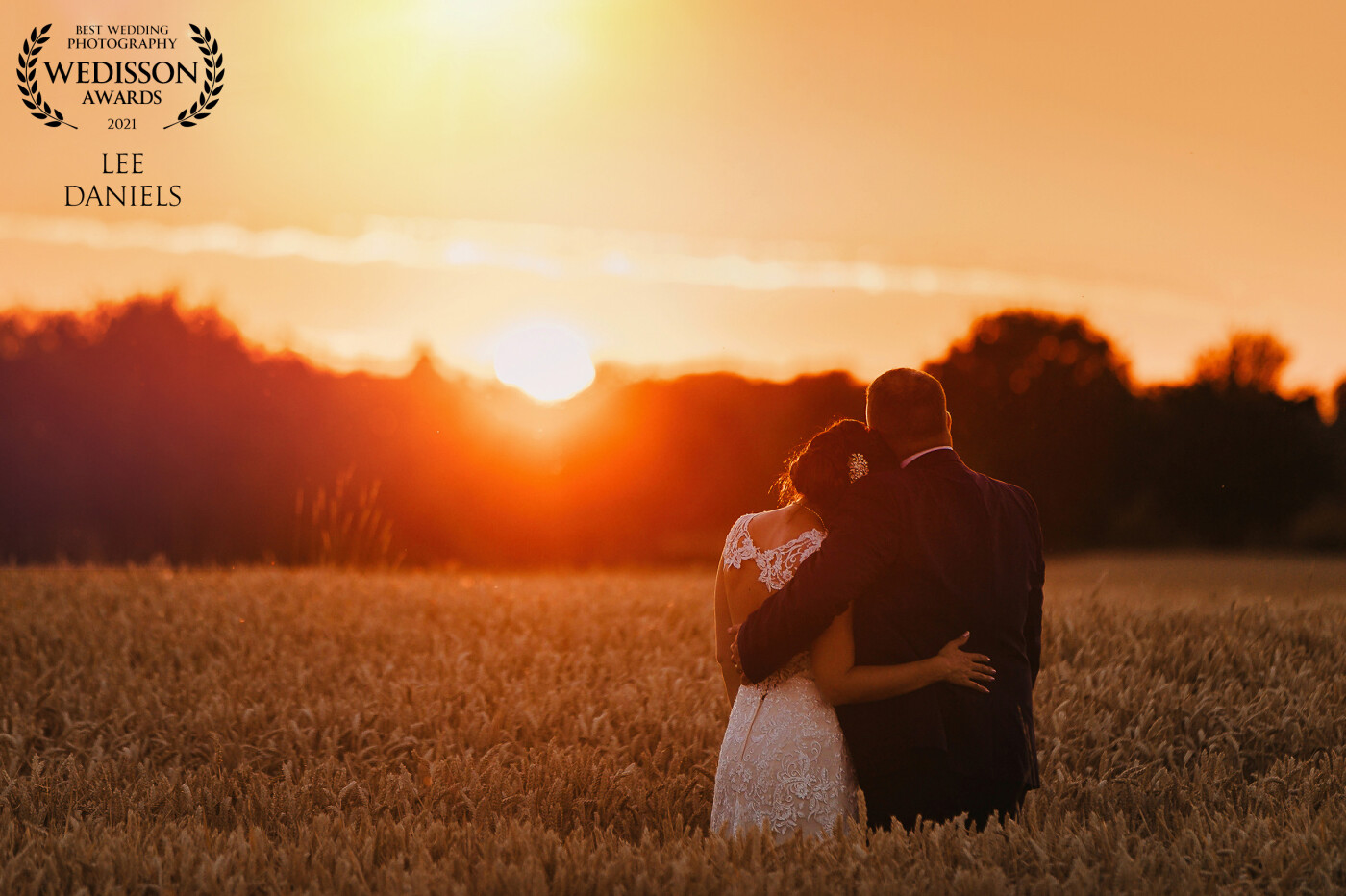 A moment of reflection! Couple's portraits at sunset always go down well. This image of Suzanne & James was the last before we headed back to the venue. I just love the relaxing, tranquil vibe of this image. Venue - Old Hall Ely.
