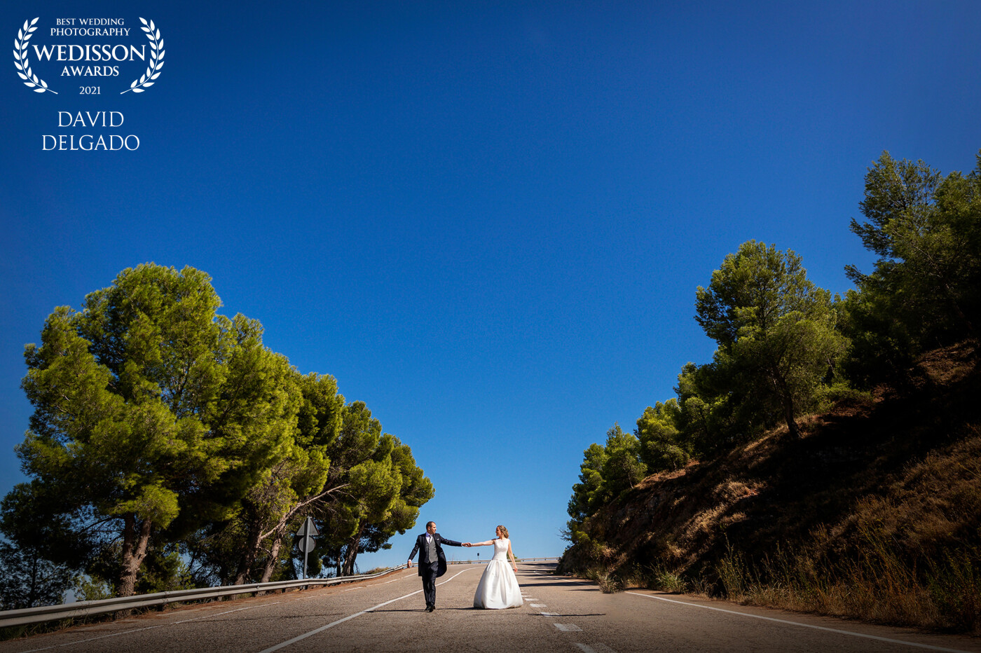You & Me - This beautiful couple chose a road in their town Fraga (Huesca) to take some photographs of their wedding report and to take a beautiful memory in their lives of this important day for them.