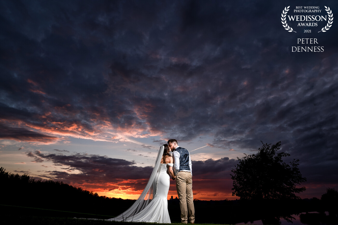 On the 4th time of trying Aj and Hannah finally managed to tie the knot at the Old Hall in Ely, and the sunset couldn't have been more perfect! I love a bit of off camera flash and combined with a wide angle lens, it allowed me to perfectly capture the scene.