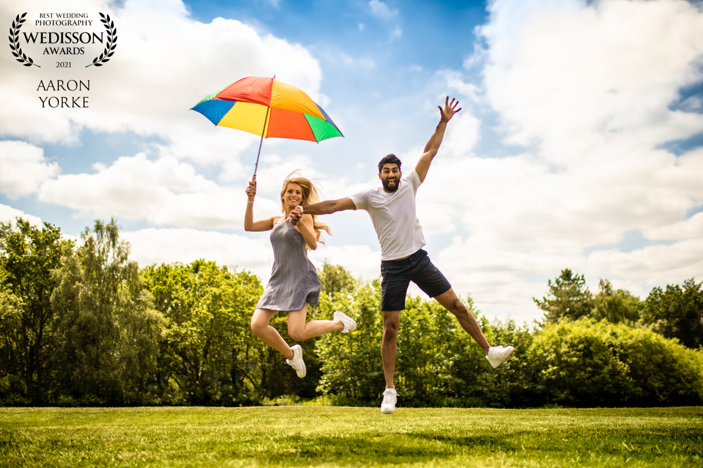 I took this shot during a pre wedding shoot at the awesome Forest of Arden in Warwickshire. The couple were up for anything creative and fun, so I took this umbrella and we tried loads of different positions, I like this one the best!