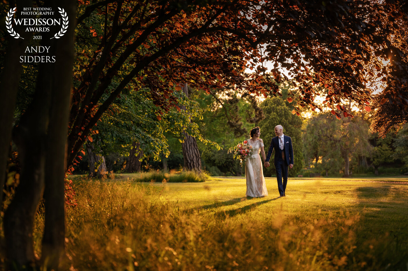 We were blessed with beautiful golden hour light for Alison and Jonny's wedding at Fanhams Hall. Here's a shot of the newlyweds backlit by the golden light.