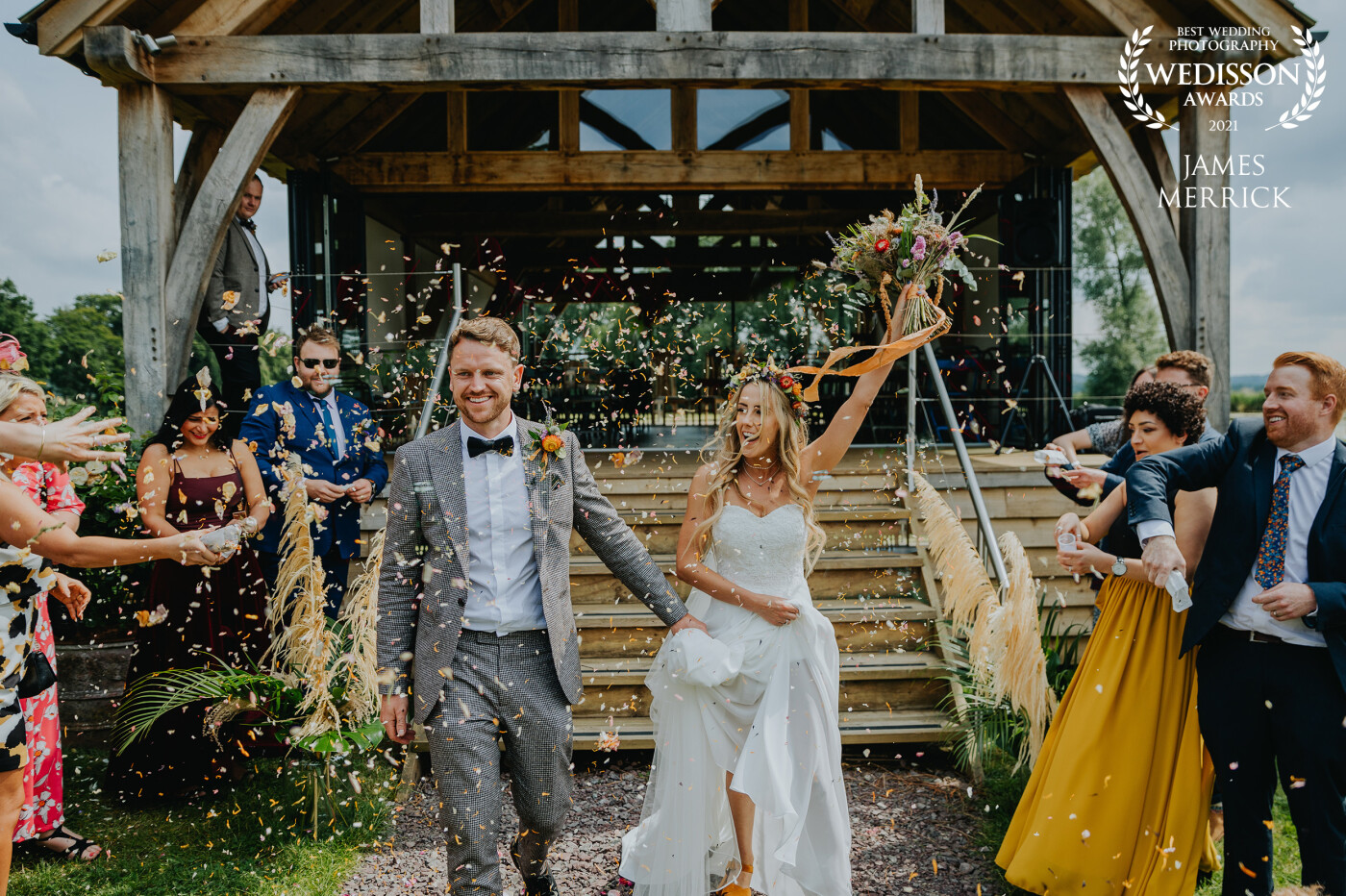 Emma & Christian were married at a small but beautiful venue in Shropshire, England called Cheswell Grange. The boathouse by a lake was a perfect setting for the wedding ceremony and the confetti shot that followed walking down the steps to the masses of guests was full of emotion and happiness! I love a colour explosion like this!