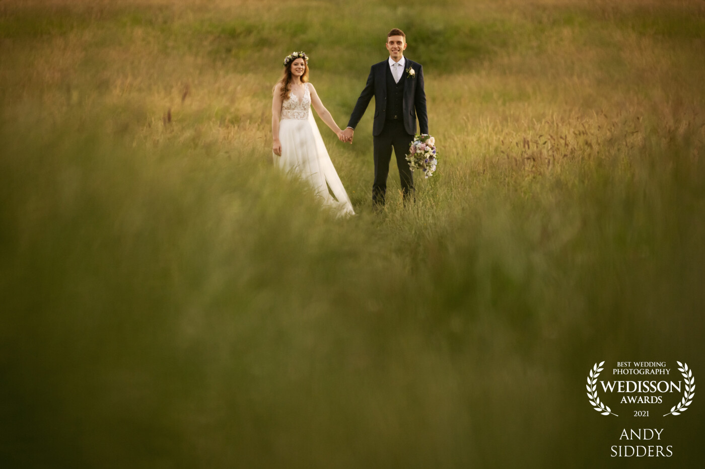 The bride and groom were absolute superstars! We took a stroll into a field with long grass and were blessed with beautiful evening light.<br />
<br />
Captured at a wedding at The Five Arrows Hotel, Waddesdon Manor.