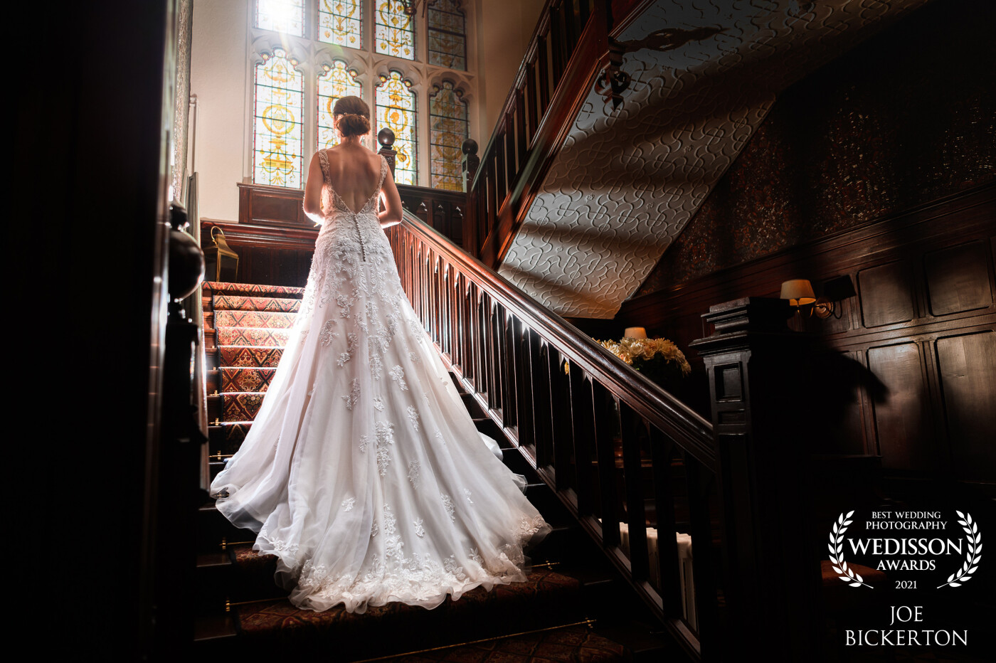 Katherine's elegant dress just lent itself to being displayed on the staircase at Tyn Dwr Hall in North Wales. This shot was taken with an OCF light at 1/64 power just in front of the bride.