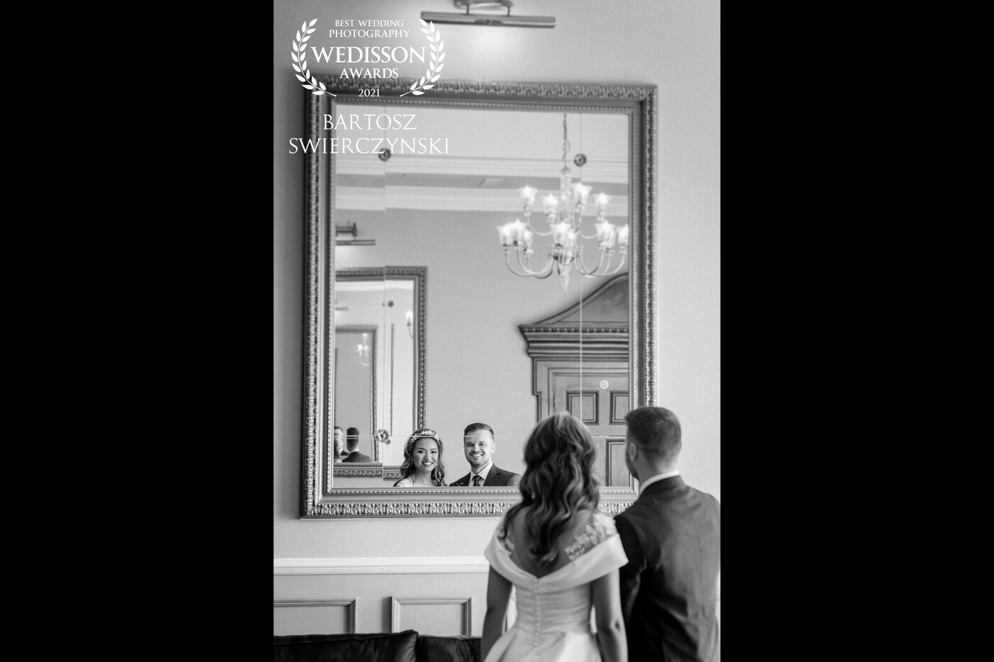 The photo was taken just before Karen & Jakub were making entrance to the wedding reception room. <br />
I have spotted beautiful mirrors on opposite walls making a great portrait opportunity. <br />
I asked my couple to stand in front of one of them for few seconds.