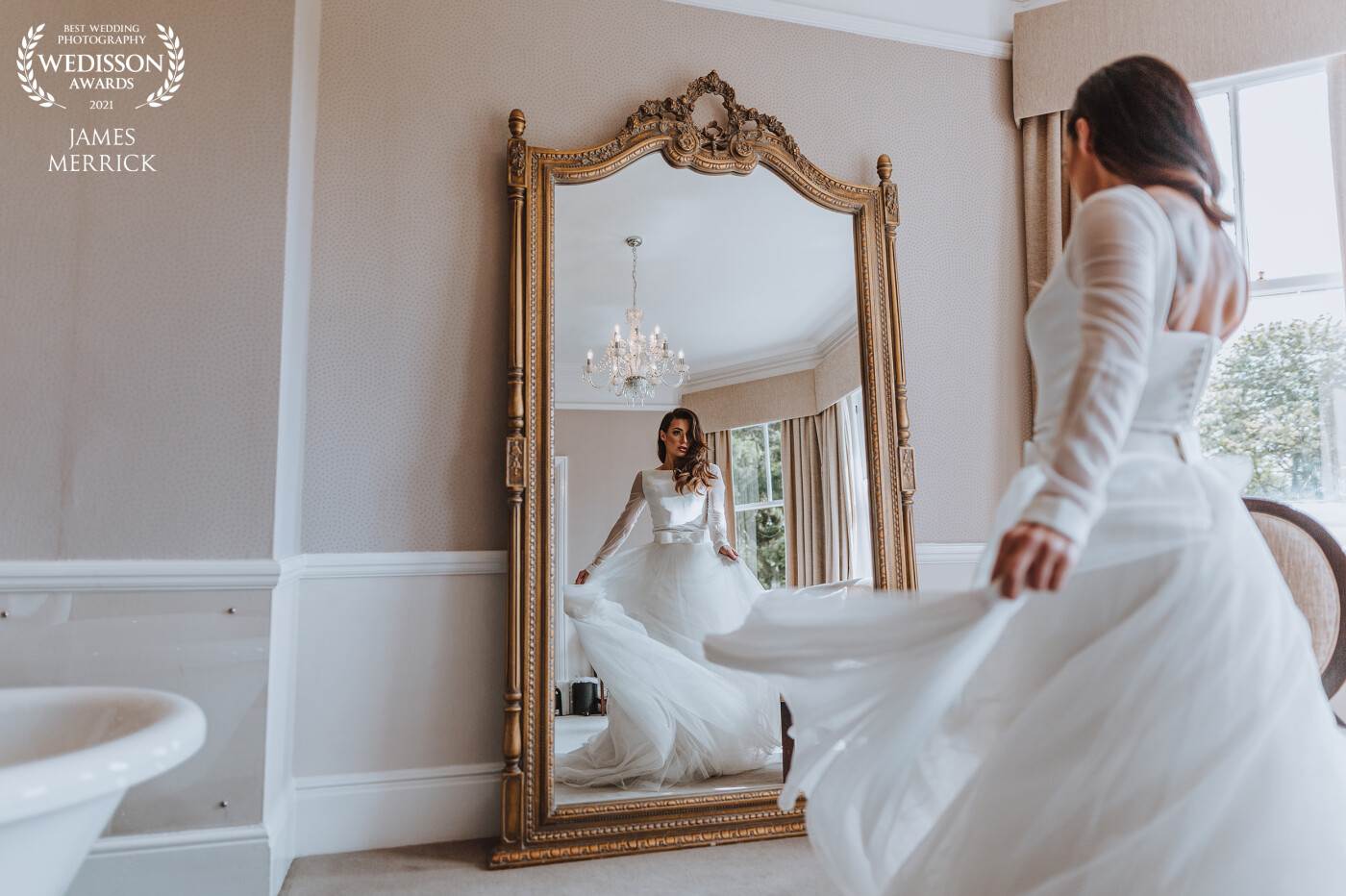 This beautiful mirror at Tern Hill Hall in Shropshire, UK is just perfect for a full length shot of the bride getting ready! the added movement of the swinging dress really added to the shot.