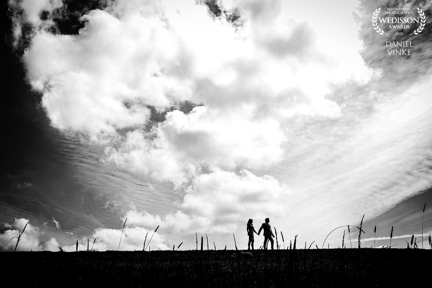 Great clouds in the sky and this hill made a perfect opportunity for some nice silhouettes! This couple walked on the hill and I waited for them to be between some high grass.
