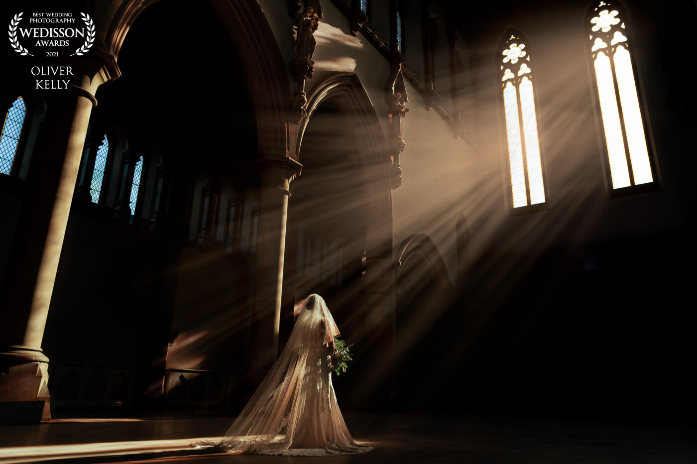 Low winter light streaming through the windows of the gorgeous Monastery in Manchester . .   Throw a bride into that light and the results speak for themselves! I absolutely love playing with pockets of natural light or creating my own using flash to get creative with my images!