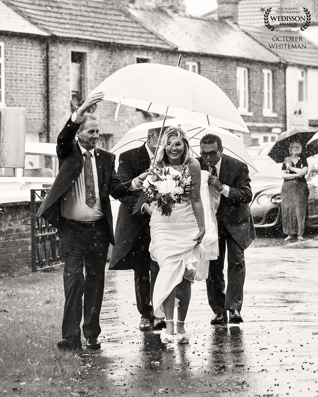 Sophie - always smiling no matter what the weather! After postponing her wedding from 2020 she couldn’t be happier to finally walk down that aisle! Oh and by the time the newly weds emerged from the church, the storm clouds had passed and the sun shone for the rest of the day!