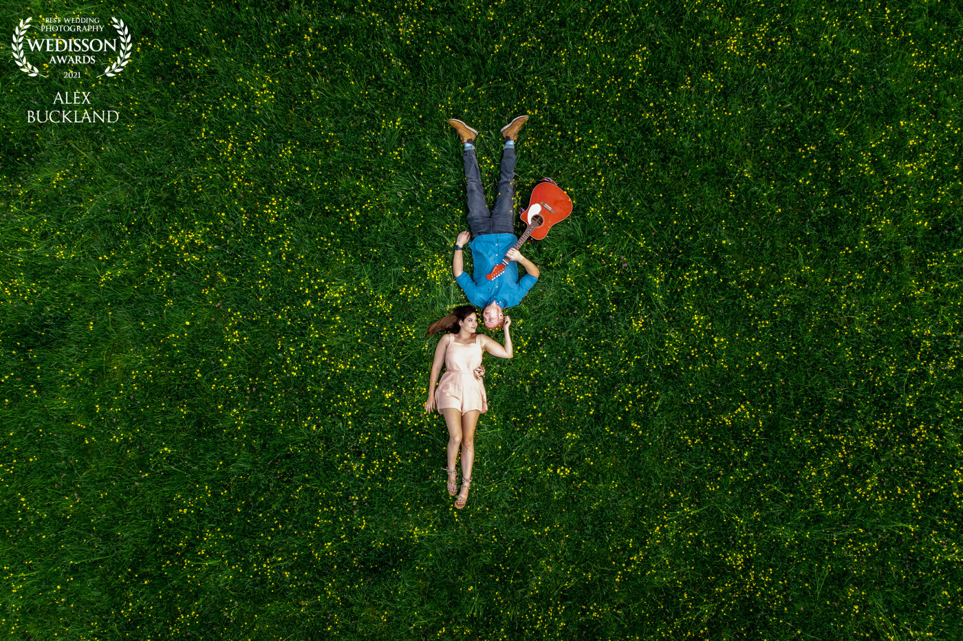 We had originally planned for this couples pre wedding shoot in a rapeseed field but missed out by a couple of days due to the field being harvested. So instead, we found this field of buttercups for this drone shot. We incorporated the guitar as the couple are in a band and really helped represent them!