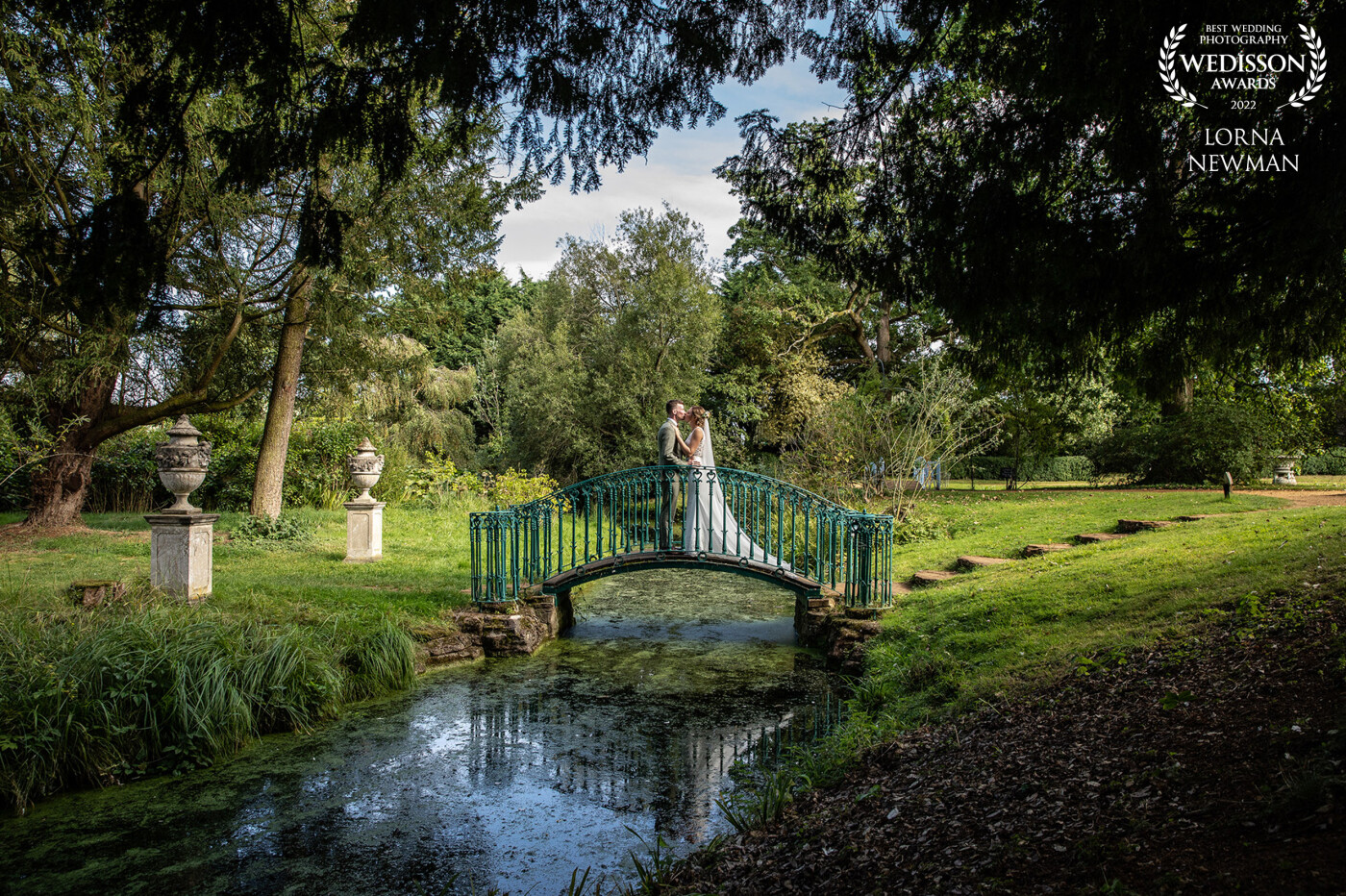 A shot from Charlie & Paul’s wedding at Shuttleworth in Biggleswade, Bedfordshire.<br />
We took a walk down the beautiful Swiss Gardens to give them a moment alone after they got married,  and had to take advantage of this pretty bridge that is right at the center ????  I love this location, it looks like something out of a painting....<br />
.<br />
.<br />
.