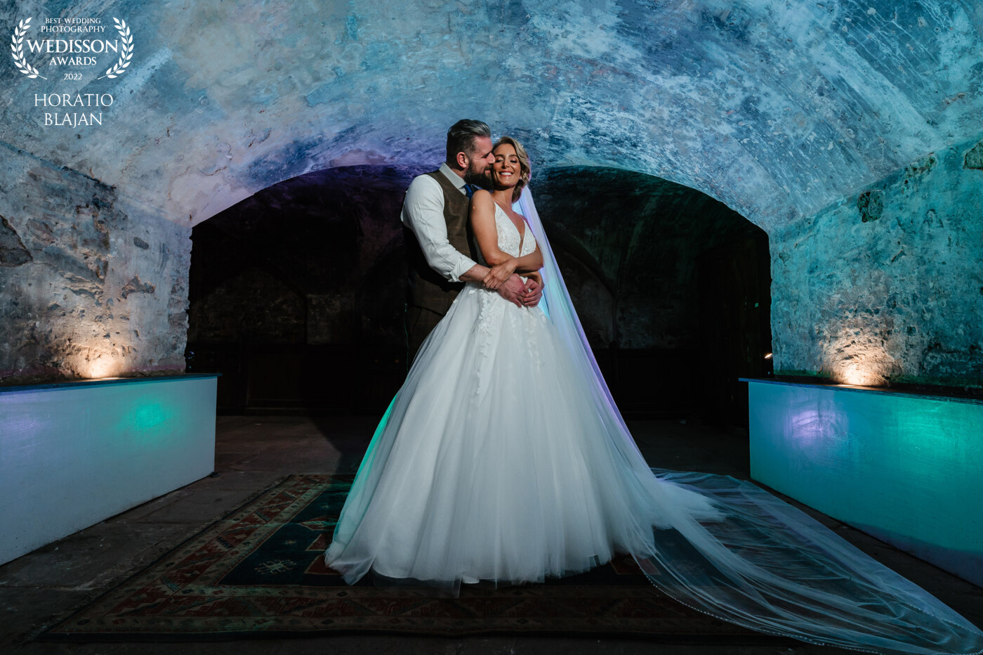 Gemma and Sam were the perfect bride and groom. You can see that they love each other by the look in their eyes. I have had the privilege to capture their images and create the one above in a dark environment by adding lots of colour and light.