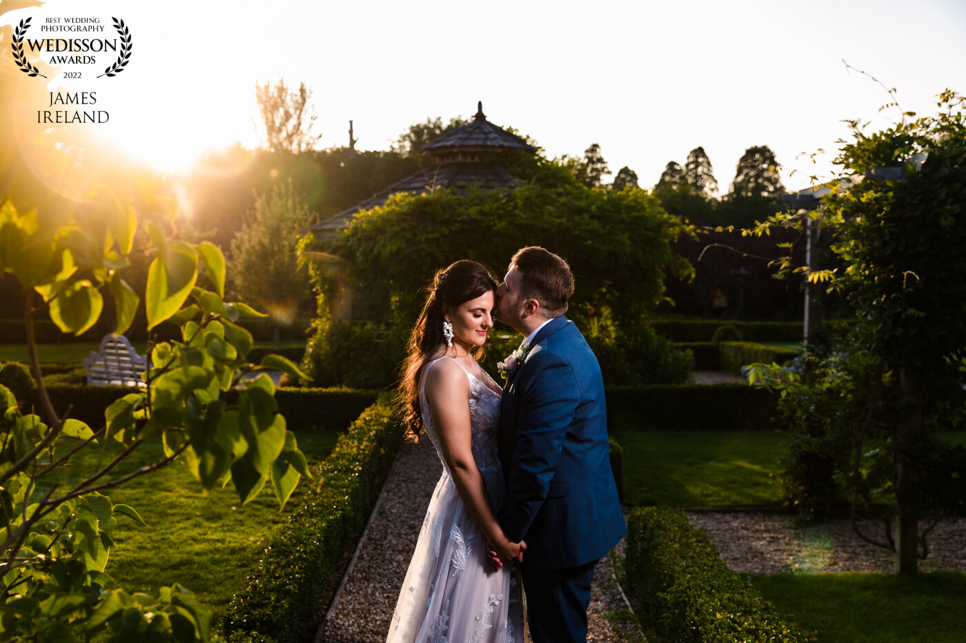 We got so lucky with the golden hour light at Lily & Charlie’s wedding, considering we’d had a little rain earlier in the day. I’m always looking for symmetry and leading lines in my compositions, and the paths at pergola at The Secret Garden always lend themselves nicely to this. I used the sunlight to rim light the couple and had a flash with a small octabox to fill in the shadows on their faces. The sun’s flare was just an added bonus!