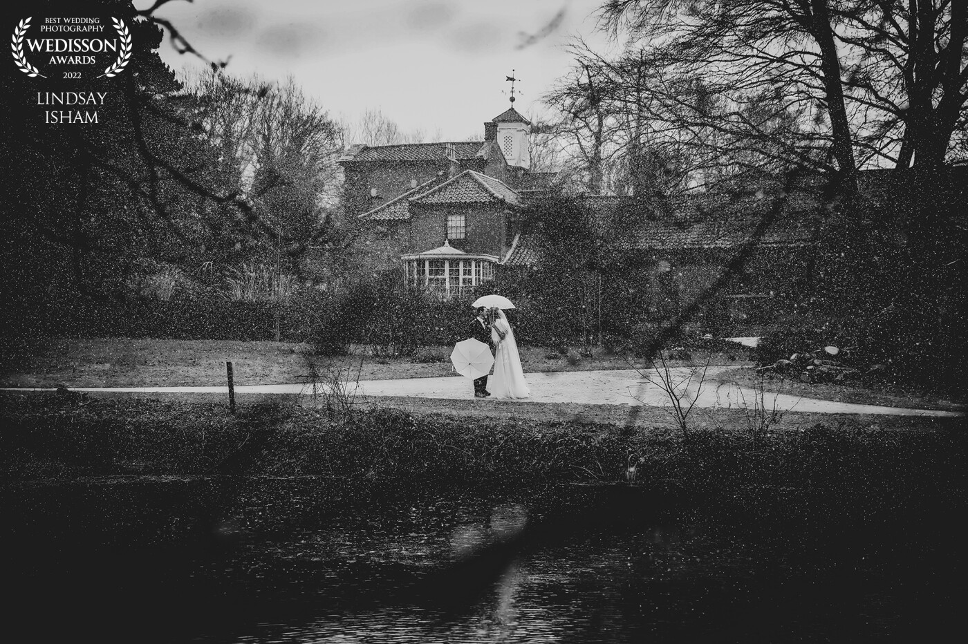 This was such a magical day in so many ways!  The weather didn't appear to be on Dan & Brittaney's side, however, that didn't stop venturing out in the grounds of the stunningly beautiful grounds of Elsham Hall on their snow filled wedding day.  I love the moodiness of this black & white photo.  If I could have snow on every wedding day... I would!