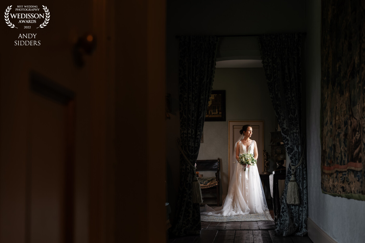 This portrait was taken at Chenies Manor in Buckinghamshire, UK. I positioned the bride in beautiful window light and instructed her to look out the window.
