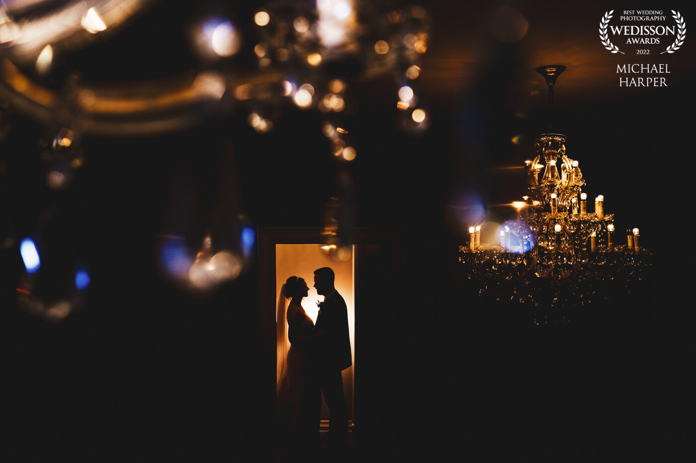 When the sun had set there was an opportunity to turn a corridor into a portrait. This was created by shooting through a chandelier whilst a flash behind the couple made a shiloutte. Please visit our Instagram for the behind the scenes video.
