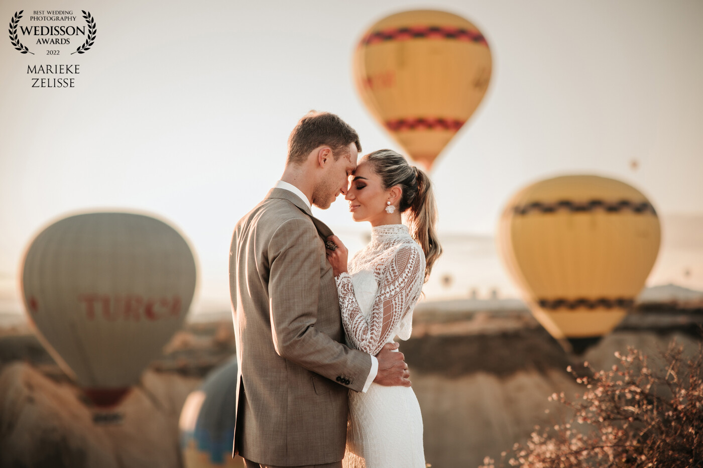 In Cappadocia every morning 165 balloons color the air with the sun going up. This is stunning to see and to capture a beautiful couple is even more stunning!