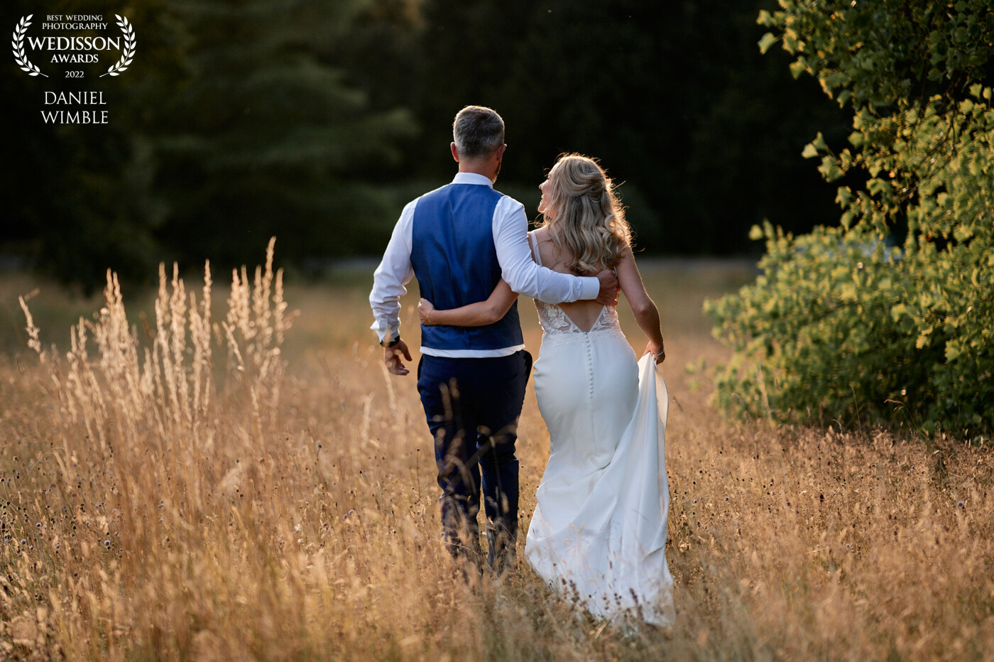 Soft golden light at the lush grounds at Plas Dinam House in Wales UK. The couple left the path and walked across the fields..couldn't ask for more.