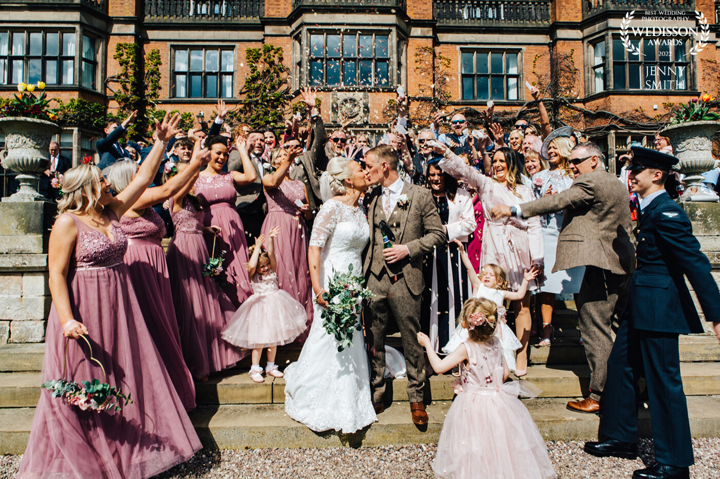 Getting all the guests together on the steps for a grand confetti moment at Emma & Andrews wedding at Hoare Cross Hall, Staffordshire