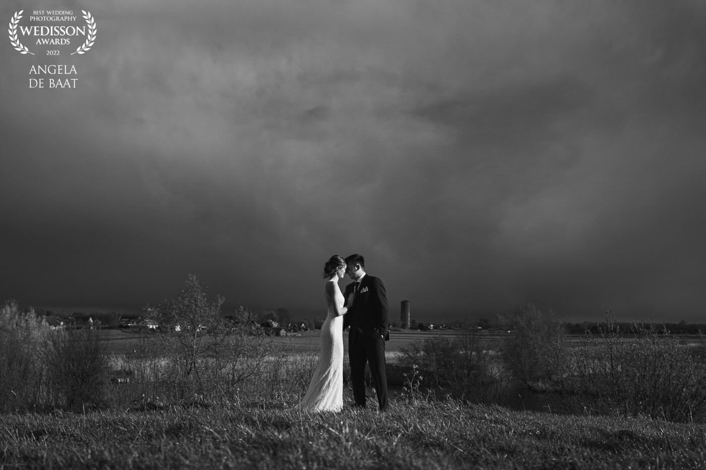It had been raining for most of the day, but during their sunset photoshoot the sun finally burst through. The dramatic clouds in the background and the stunning couple made this photo one of my favourites of the day!