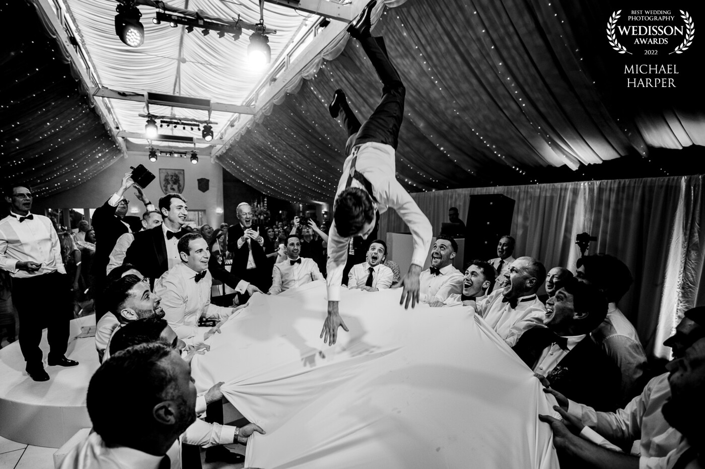 A wonderful Jewish wedding that was lucky enough to have tall ceilings! Moments like this happen fast but we were ready, shoulder to shoulder with the crowd and armed with a 16mm the moment of freefall was captured perfectly.