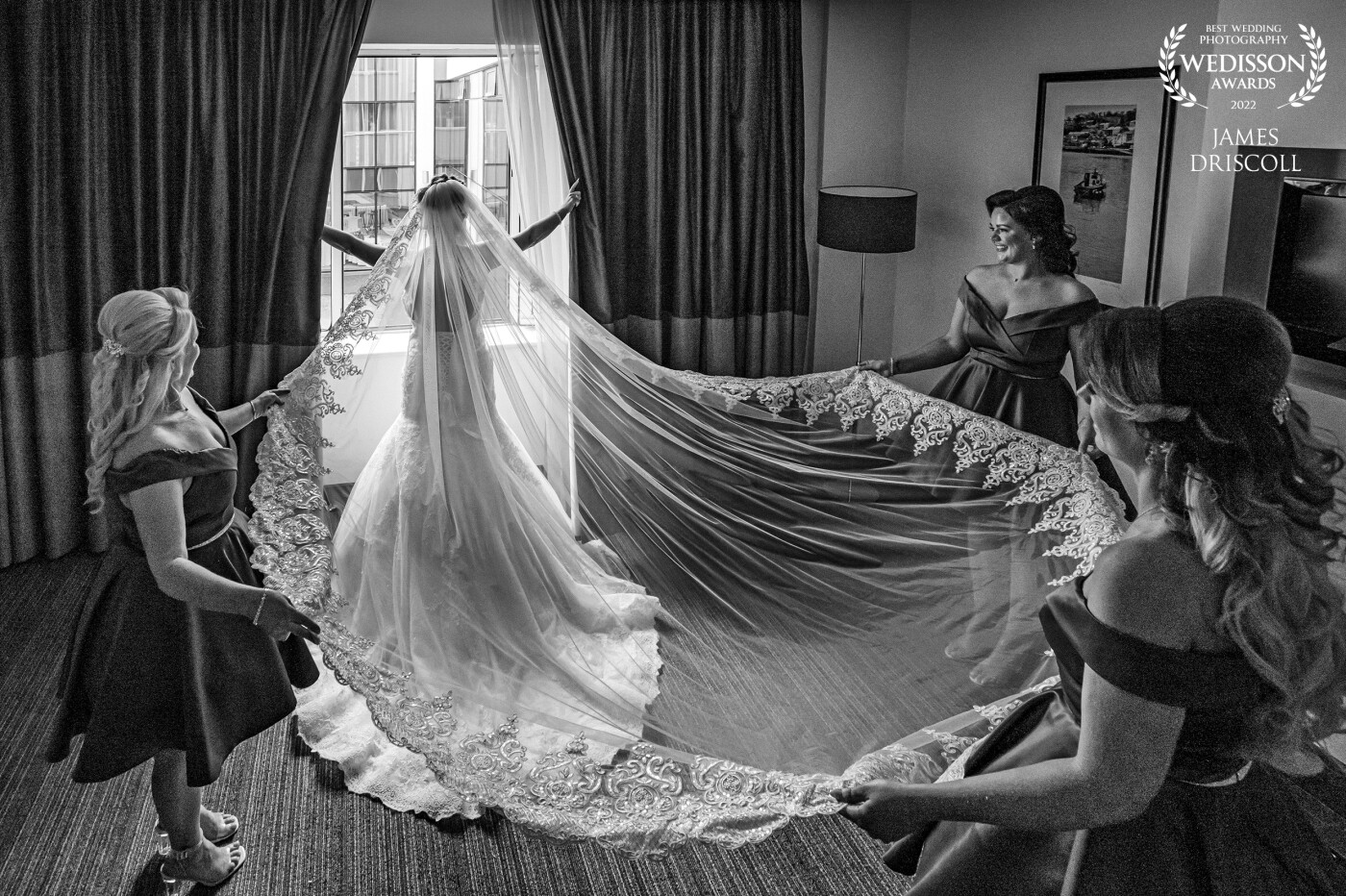 Lynsey, had this amazing veil for her wedding. It was too heavy to be able to throw up or create the swooping veil style image. So while the bridesmaid were fixing the veil into place for another image i had in mind, i quickly took this image and was delighted with the outcome when i loaded it into lightroom.