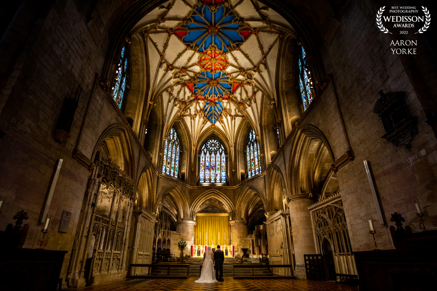Tewkesbury Abbey is simply one of the best places to get married in Worcestershire UK. It is simply stunning! There were so many shots I took but for me this one represents the abbey and the wedding perfectly.  This was the part of the ceremony where the bride and groom go to the top of the abbey and say their prayers at the alter.