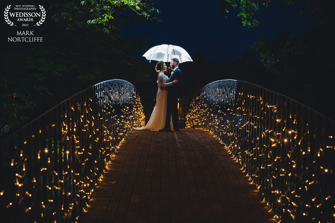 Amazing wedding of Tonya & Jamie at the equally amazing Bassmead Manor Barns - Cambridgeshire<br />
The bridge is the perfect spot to capture this image and the venue have invested heavily to make sure the setting is just right.