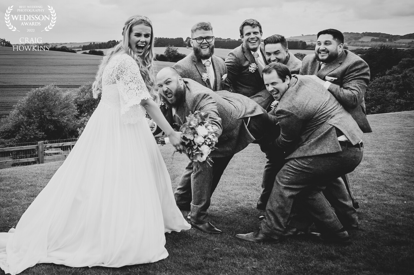 This picture says it all! I love it when I can have so much fun with my clients on their wedding. This shot was one of many fun times during the wedding day. It was great to get this photo of the groomsmen taking back their friend. Sometimes is hard to let go!!
